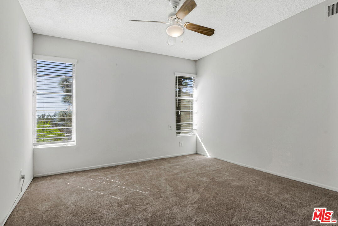 2695 Cordelia Road Los Angeles, CA 90049 - Photo 28 of 33 a view of an empty room with a window