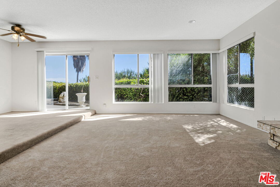 2695 Cordelia Road Los Angeles, CA 90049 - Photo 5 of 33 a view of an empty room with windows and closet