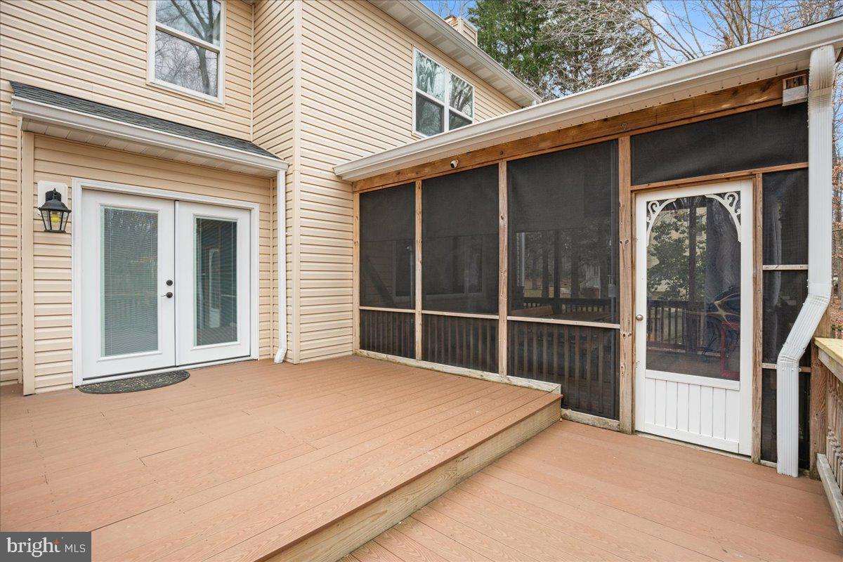 650 Small Reward Road Huntingtown, MD 20639 - Photo 17 of 21 a view of a house with a large window