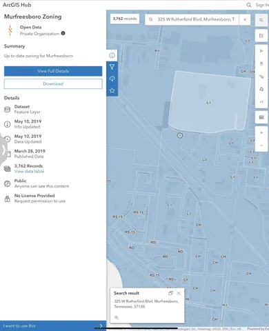 a view of a house with a garage