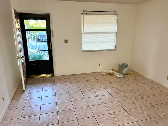 a view of a kitchen and a window
