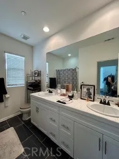 a table and chairs in front of a house