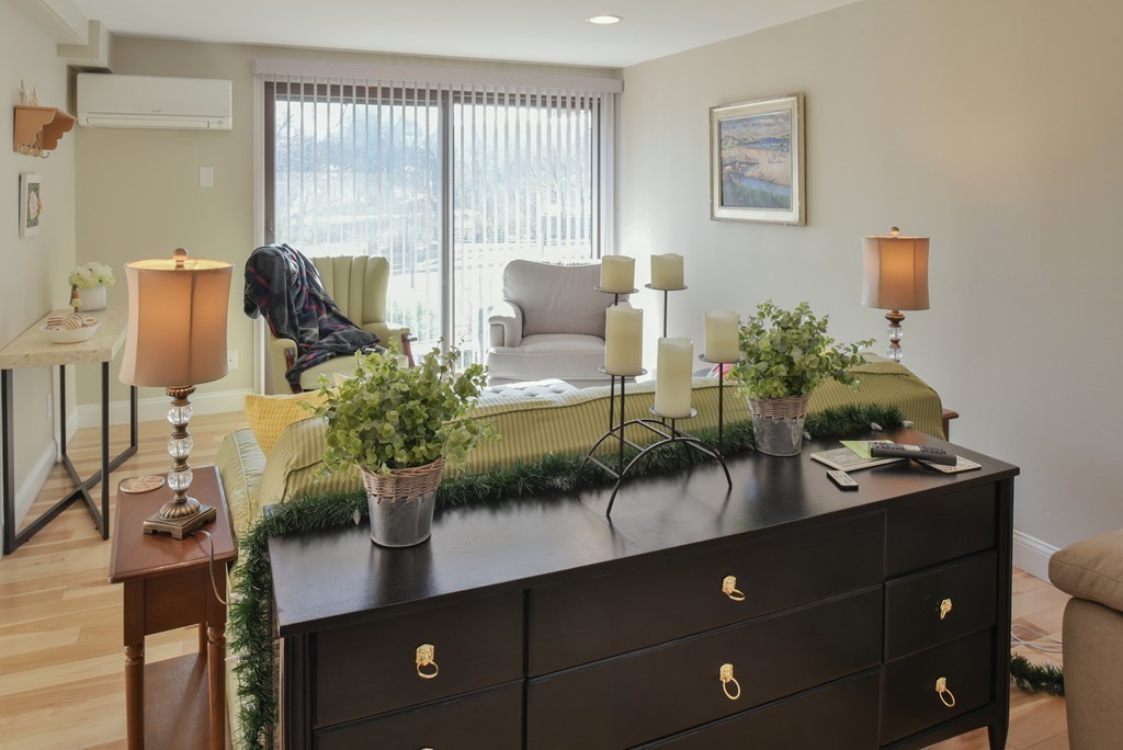 18 Atlantic Road, Unit 35 Gloucester, MA 01930 - Photo 9 of 24 a living room with furniture and potted plant