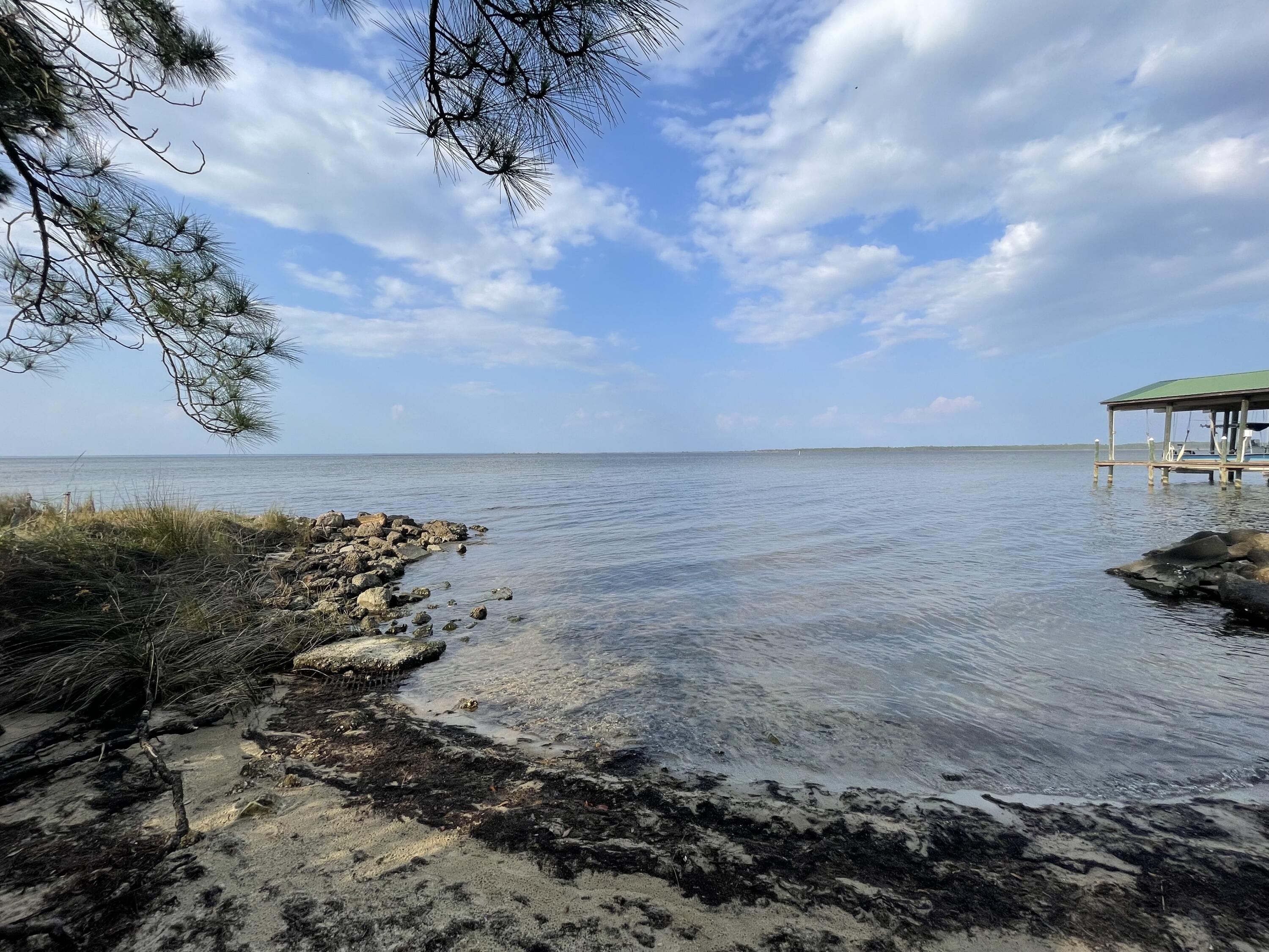 Lot 2-blk Lot 2-blk F Exclusive Beach Santa Rosa Beach, FL 32459 - Photo 22 of 22 a view of a dry yard with wooden fence