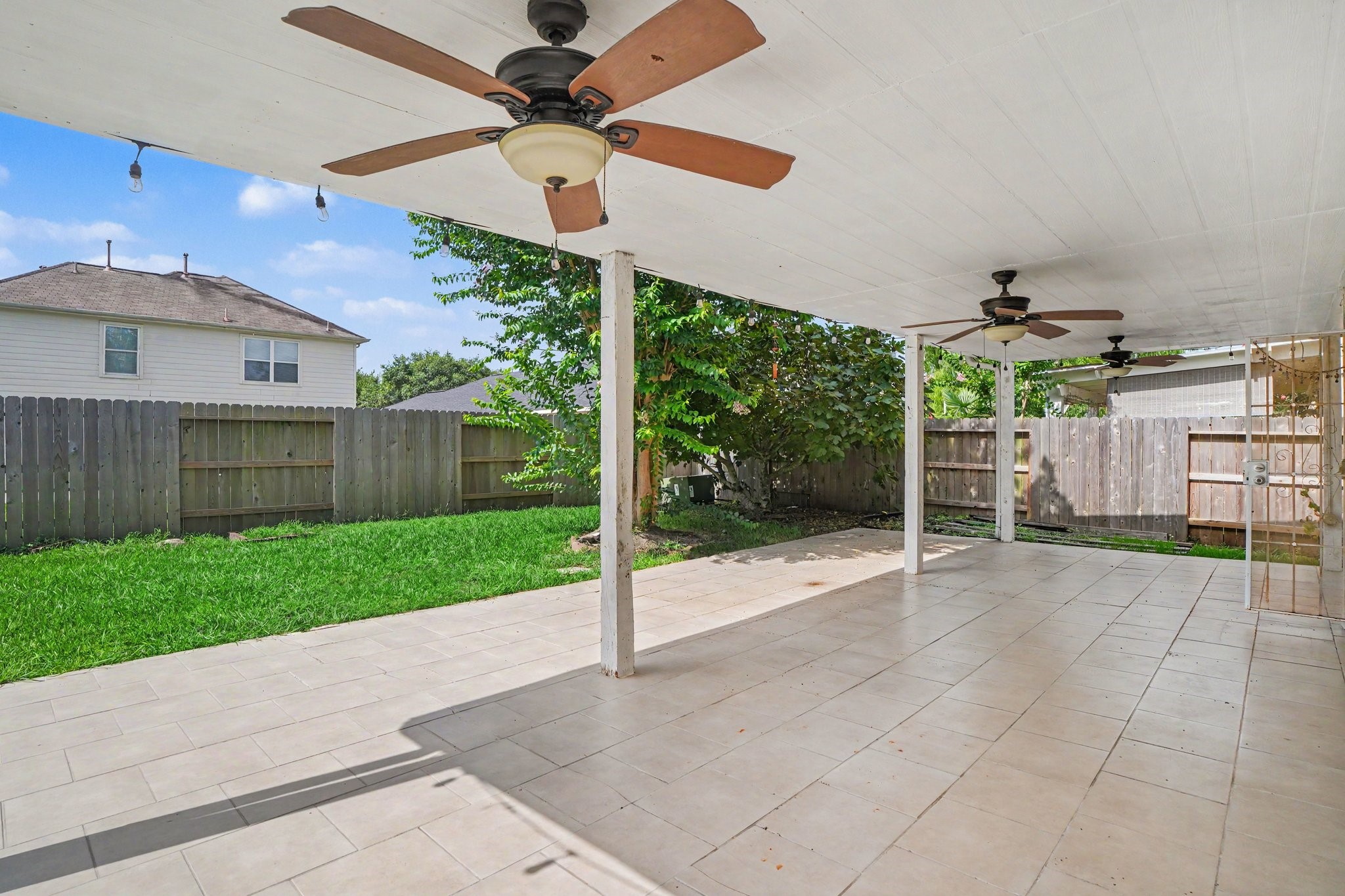 5622 Wasabi Lane Baytown, TX 77521 - Photo 25 of 29 a view of a backyard with porch