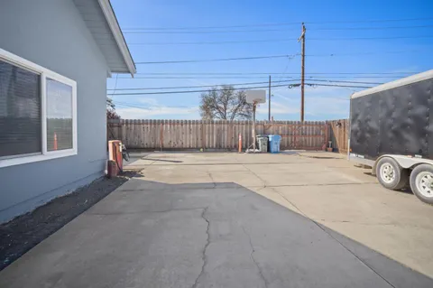 a view of a back yard of the house