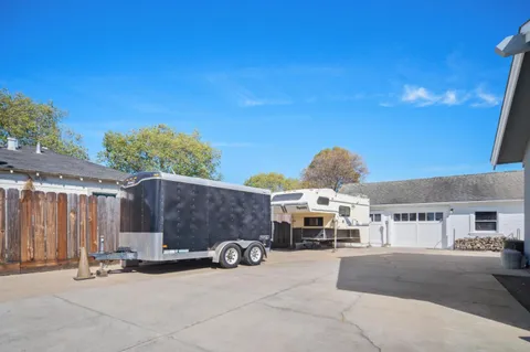a view of a car park in front of house