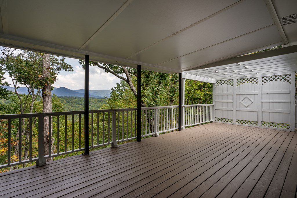 1265 Hunters Ridge Jasper, GA 30143 - Photo 42 of 50 a view of a balcony with wooden floor