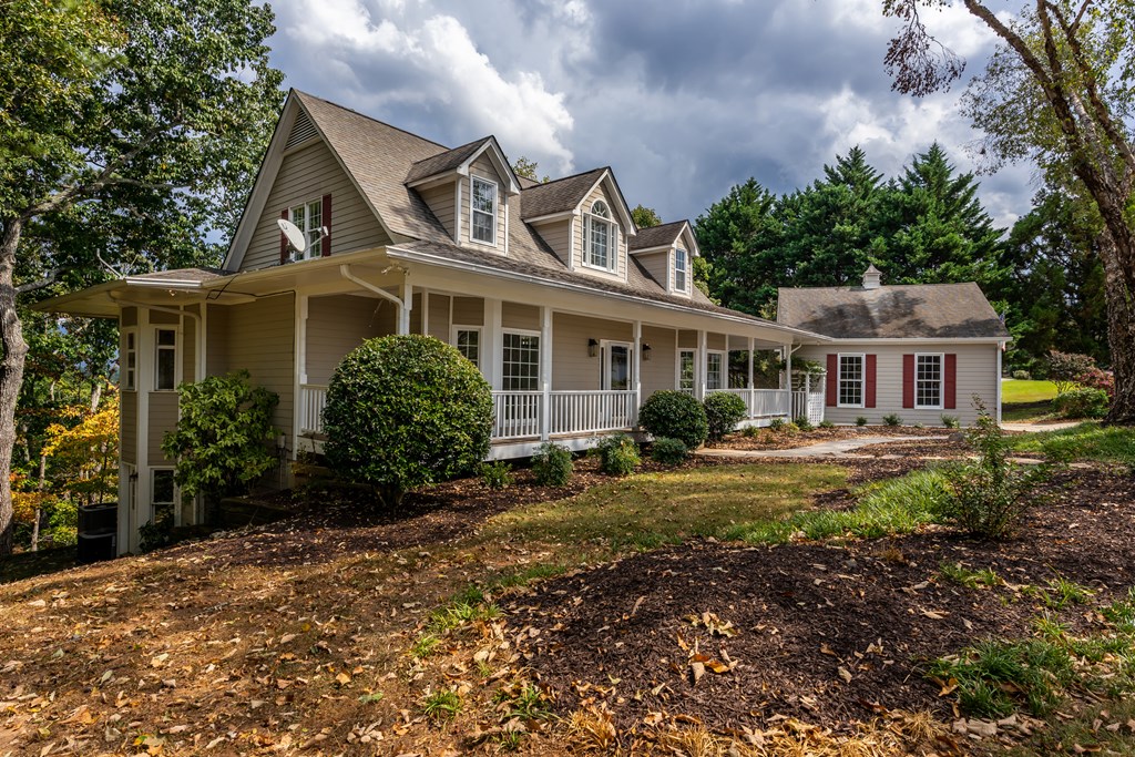 1265 Hunters Ridge Jasper, GA 30143 - Photo 45 of 50 a front view of a house with garden