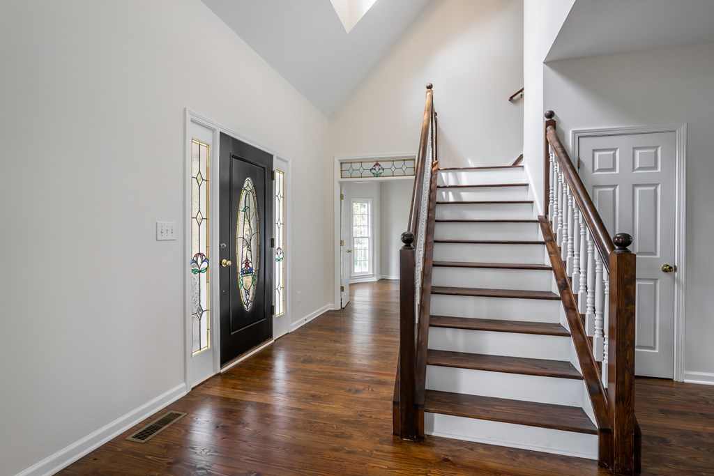 1265 Hunters Ridge Jasper, GA 30143 - Photo 5 of 50 a view of entryway with wooden floor and stairs