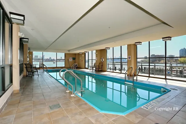 a room with lots of windows and view of balcony