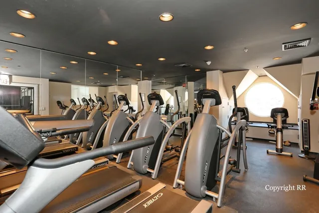a view of a room with gym equipment