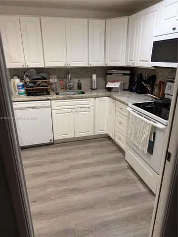 $255,000 | 4030 West Palm Aire Drive, Unit 104, Pompano Beach, FL 33069