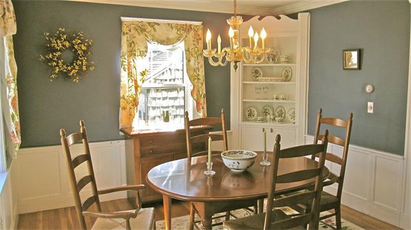 9 Glendale Road Marblehead, MA 01945 - Photo 6 of 13 a view of a dining room with furniture and chandelier