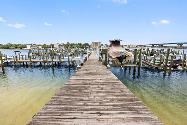 a bedroom with bed and a window