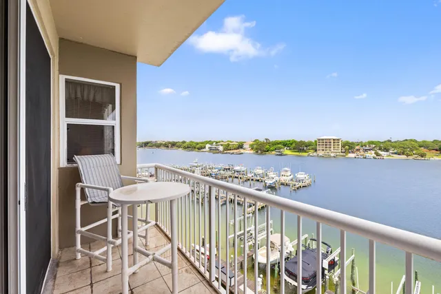 a spacious bedroom with a bed and a window