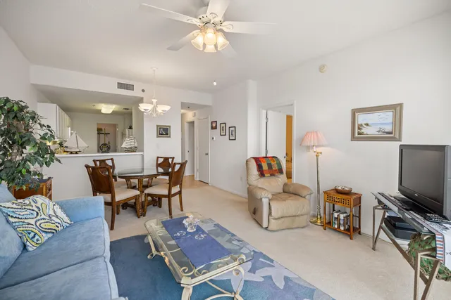 a bedroom with a bed and a chair