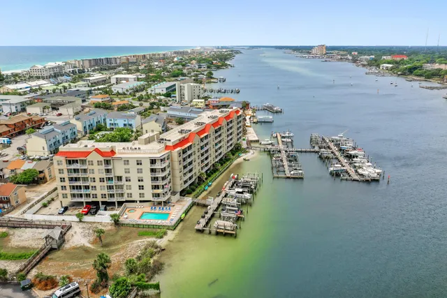 an aerial view of a house with a ocean view