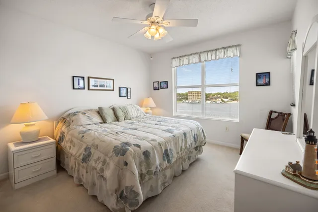 a bathroom with a sink mirror and vanity