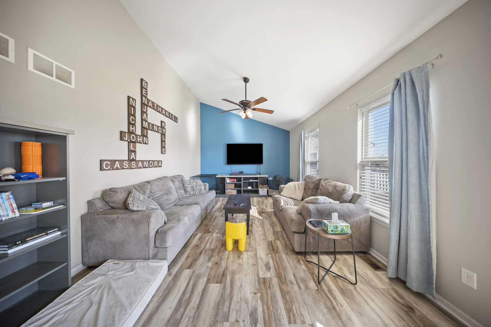 1016 Misty Landing Court Malta, IL 60150 - Photo 11 of 30 a living room with furniture and a flat screen tv