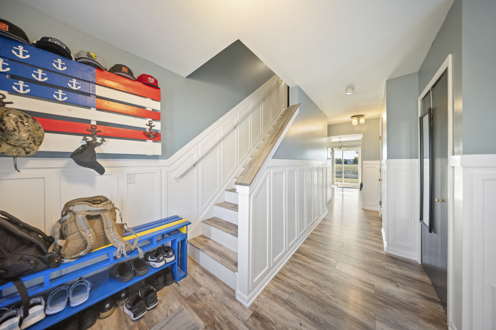1016 Misty Landing Court Malta, IL 60150 - Photo 13 of 30 a view of hallway with stairs and wooden floor