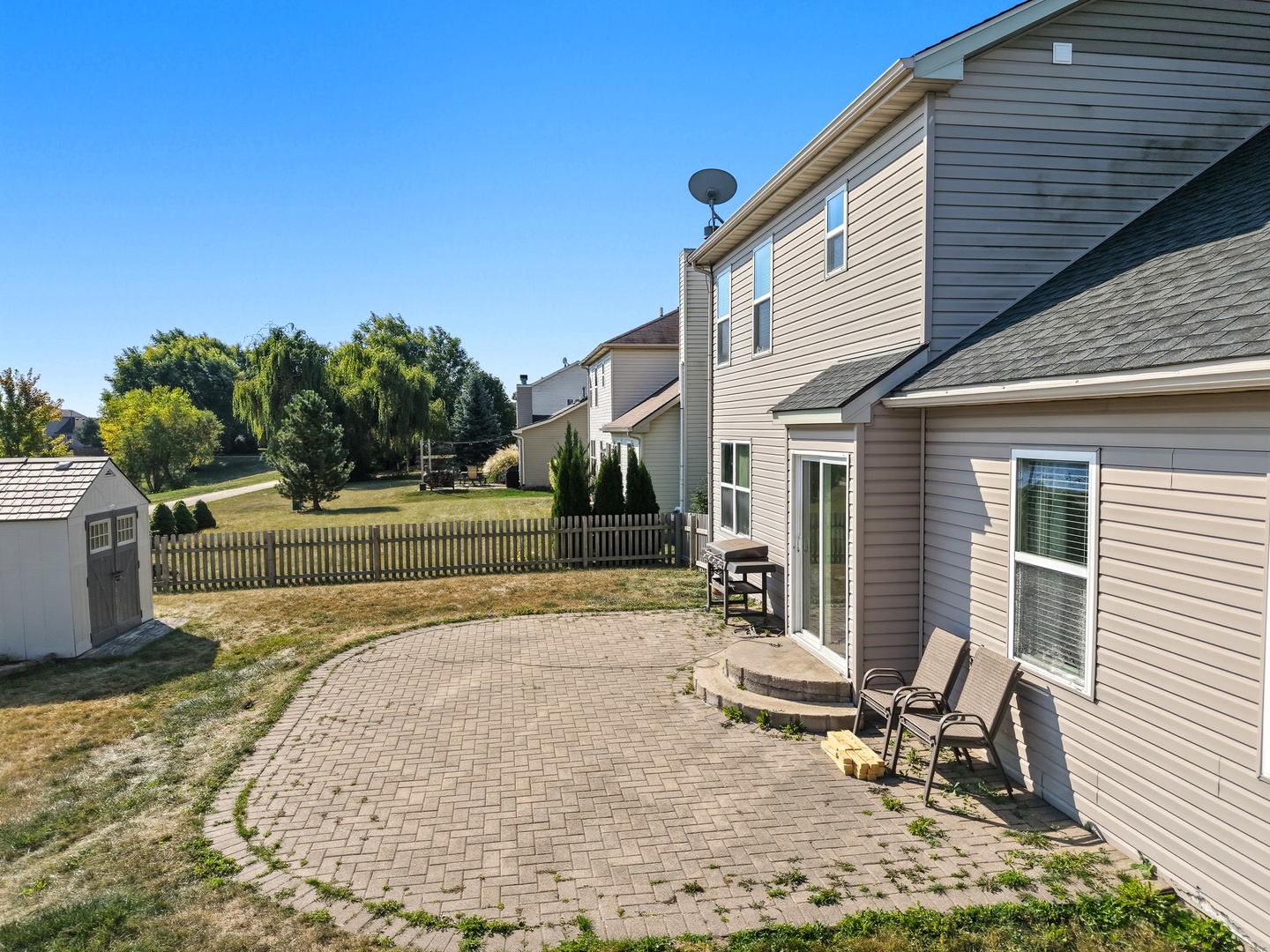 1016 Misty Landing Court Malta, IL 60150 - Photo 26 of 30 a view of a house with backyard and sitting area