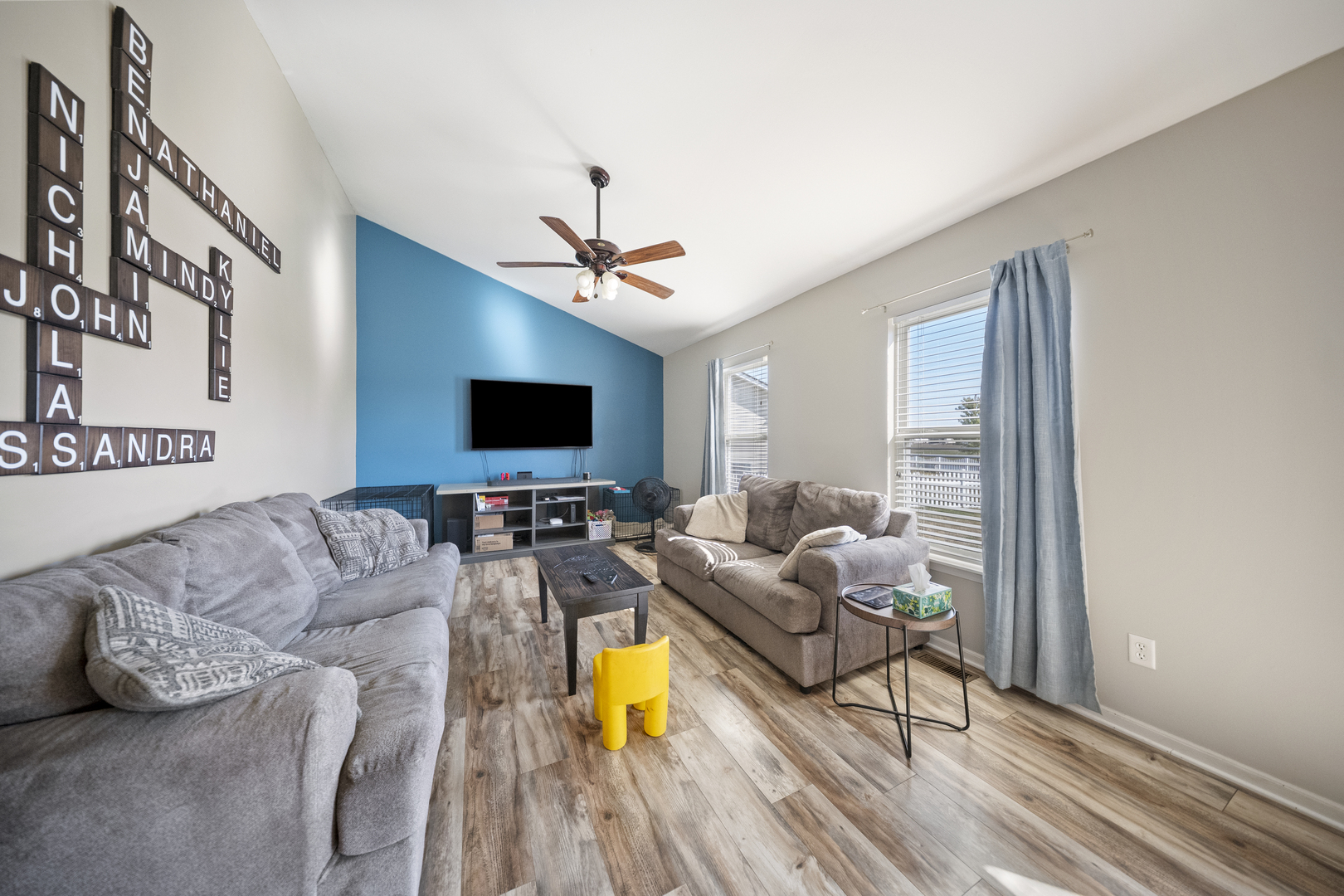1016 Misty Landing Court Malta, IL 60150 - Photo 10 of 30 a living room with furniture and a flat screen tv