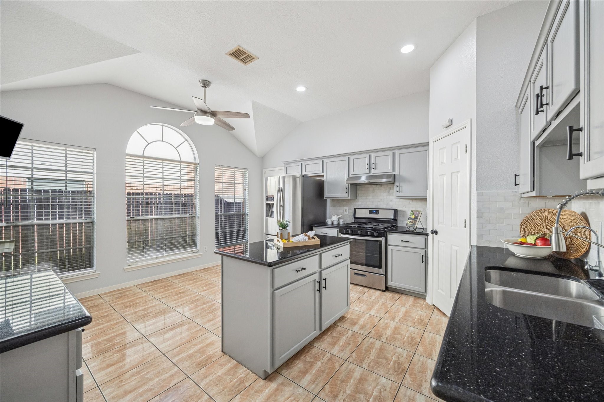 3414 Sapling Oak Drive Houston, TX 77082 - Photo 1 of 12 a kitchen with stainless steel appliances granite countertop a stove and a sink