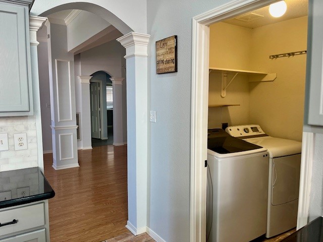 3414 Sapling Oak Drive Houston, TX 77082 - Photo 11 of 12 a view of a hallway with wooden floor and staircase