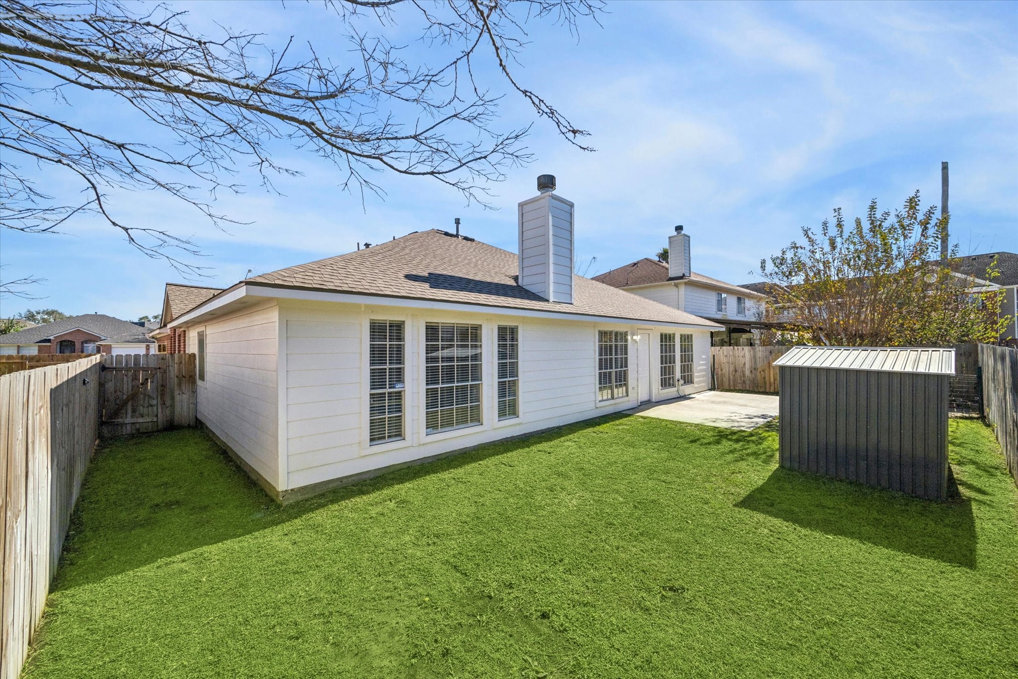 3414 Sapling Oak Drive Houston, TX 77082 - Photo 12 of 12 a view of a house with a yard and sitting area