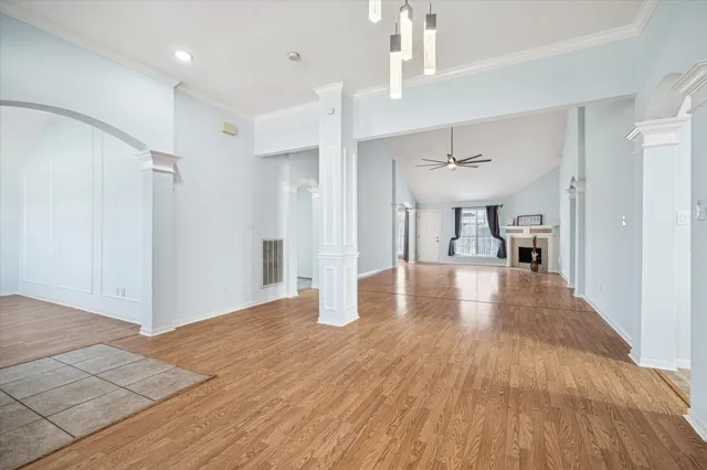 a view of a livingroom with wooden floor