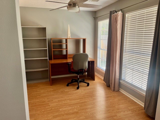 3414 Sapling Oak Drive Houston, TX 77082 - Photo 10 of 12 a view of a workspace with furniture and a window