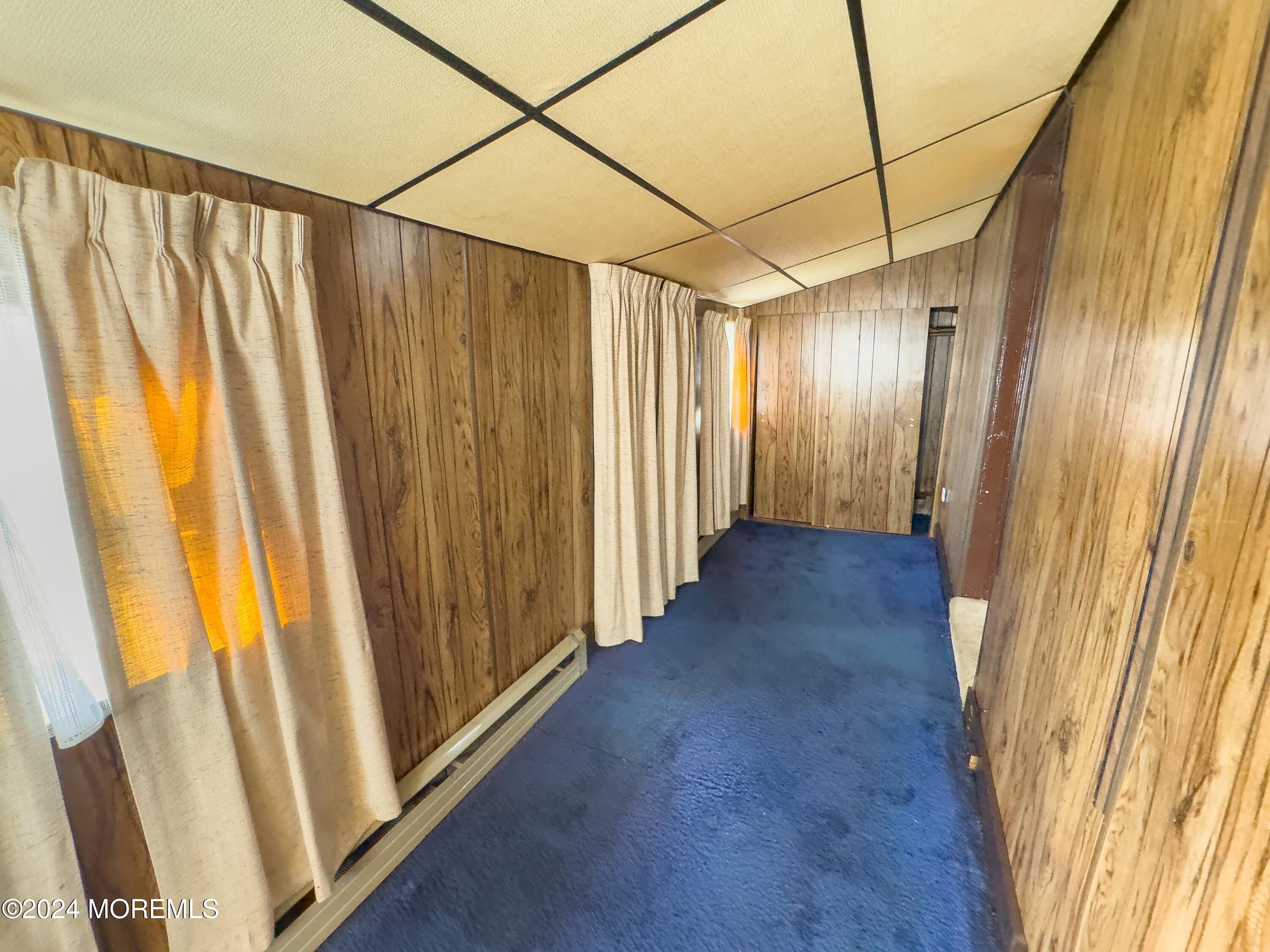273 Toms River Road Jackson, NJ 08527 - Photo 8 of 43 a view of a room with wooden walls