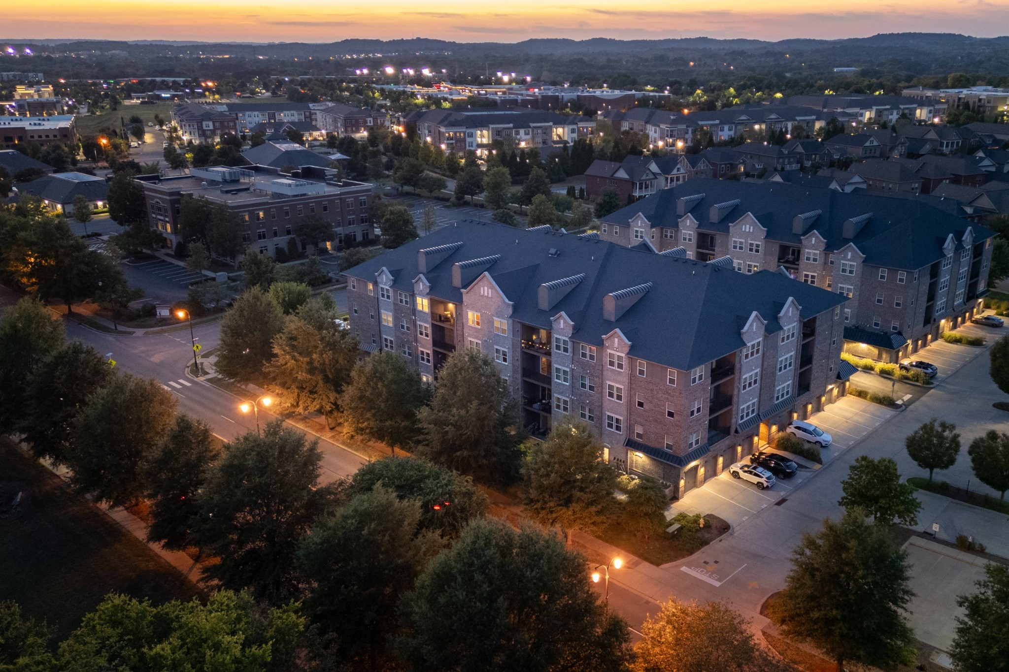 a view of a city with mountains in the background