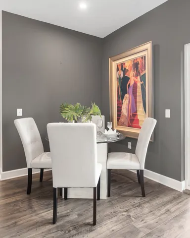 a view of a dining room with furniture