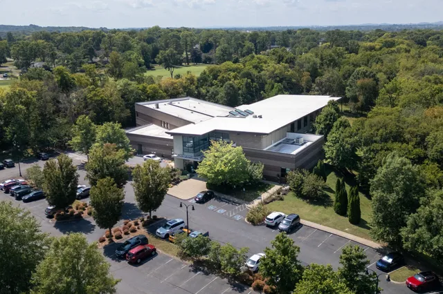 an aerial view of a house with a garden