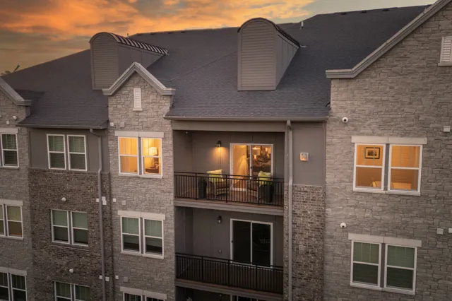 a front view of a house with yard