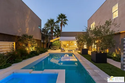 a view of a house with swimming pool