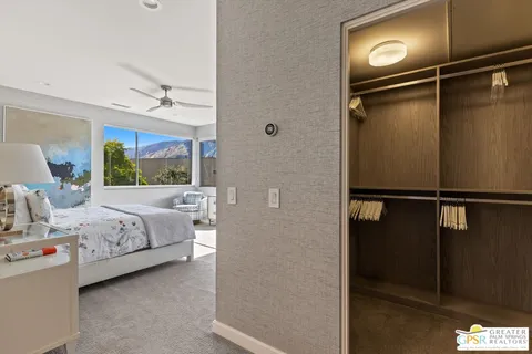 a bathroom with a shower a toilet and a sink