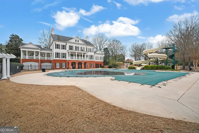 a view of a backyard with a patio
