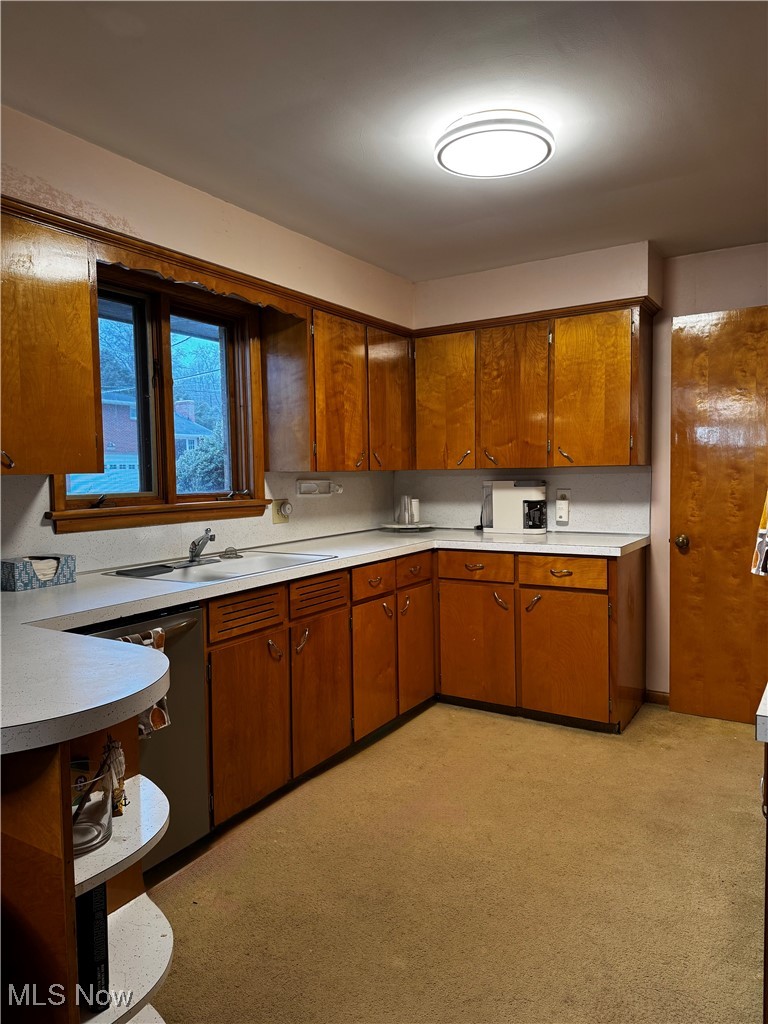 4531 8th Street Northwest Canton, OH 44708 - Photo 2 of 19 Kitchen with sink and stainless steel dishwasher