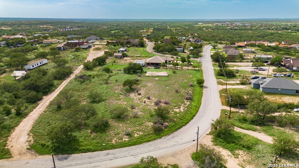 1326 Wagon Wheel Road Eagle Pass, TX 78852 - Photo 8 of 17 an aerial view of residential houses with outdoor space