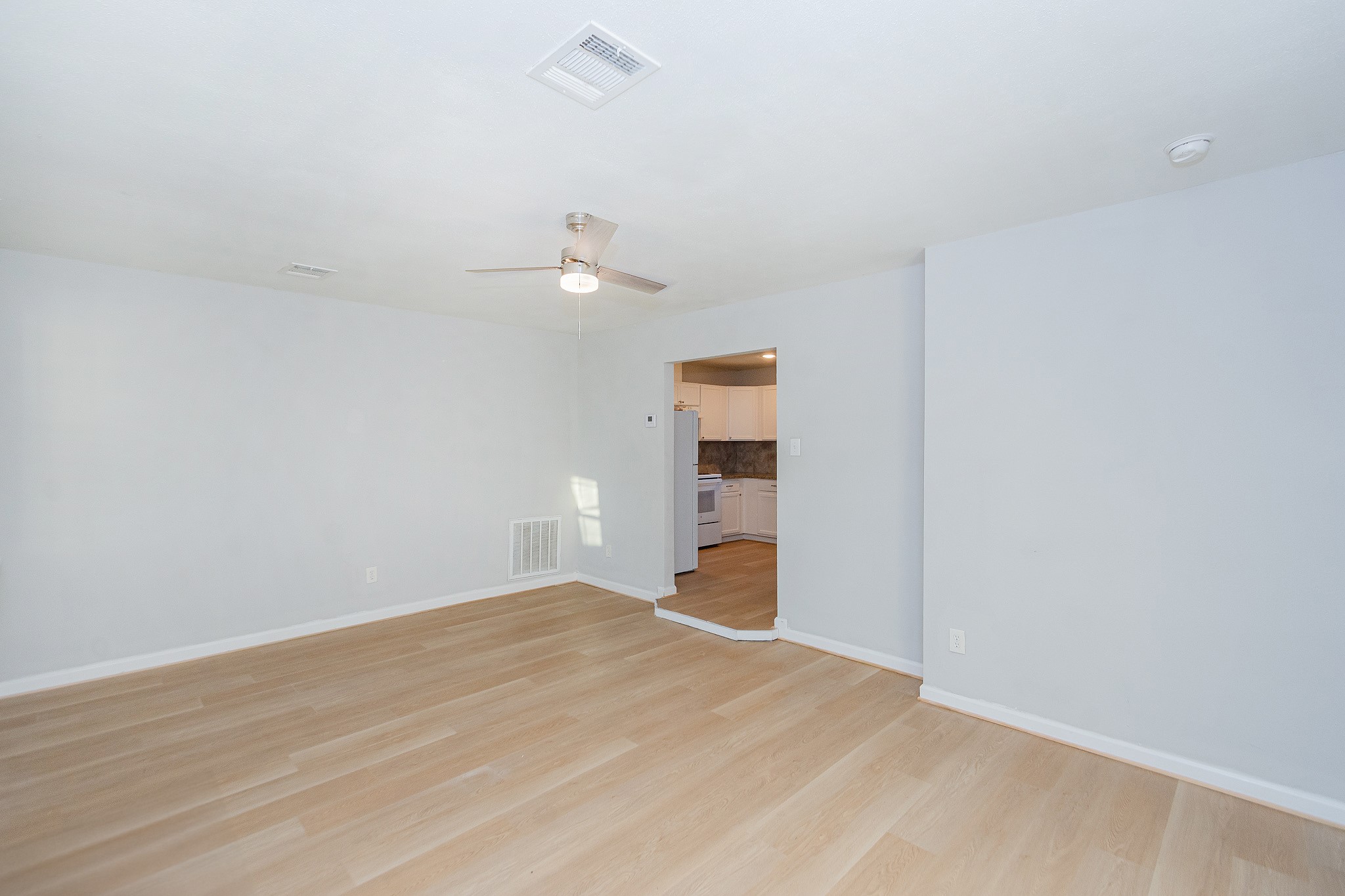 3707 Meadowlake Road Pasadena, TX 77503 - Photo 21 of 32 a view of a room with wooden floor and window