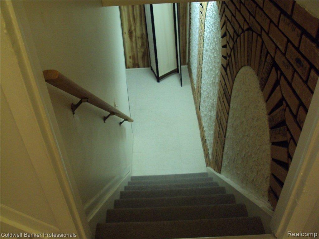 1246 Kings Cove Court, Unit 234 Rochester, MI 48306 - Photo 13 of 24 Stairs to Fin Bsmt