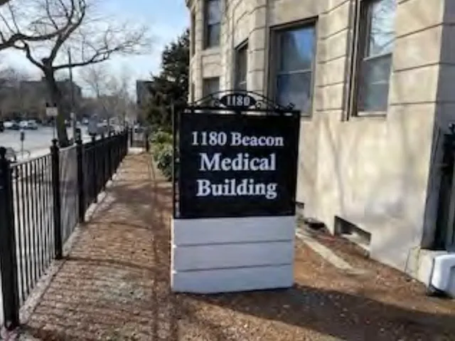 a view of a street with parking space