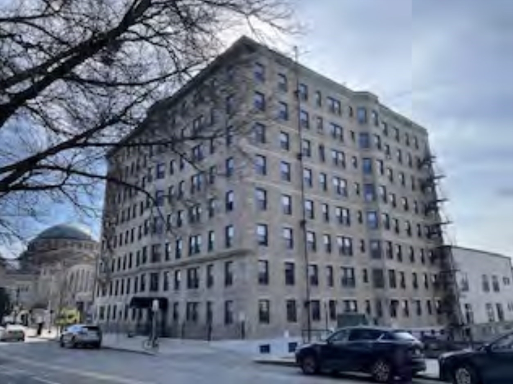 1180 Beacon Street, Unit 7C Brookline, MA 02446 - Photo 3 of 3 a view of a tall building