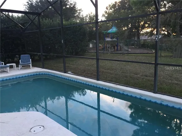 a view of a lake from a balcony