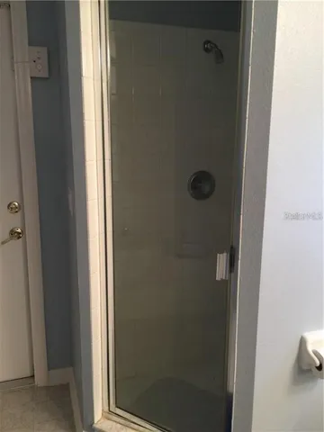 a room with furniture and a flat screen tv