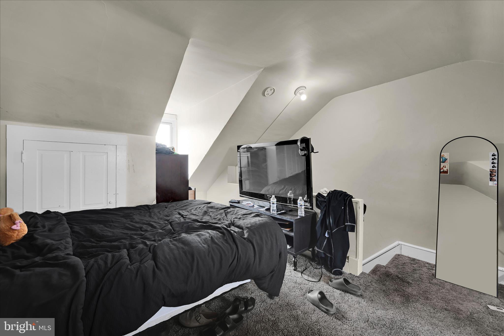 942 Pike Street Reading, PA 19604 - Photo 25 of 27 a bedroom with a bed and dresser
