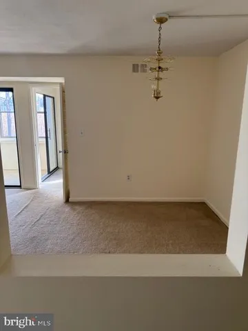 a view of a room with rack and tiles